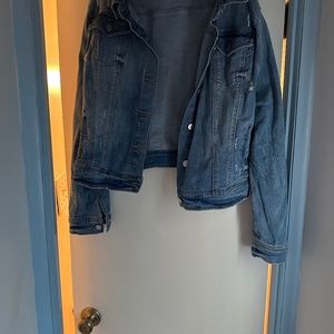 Distressed denim jacket